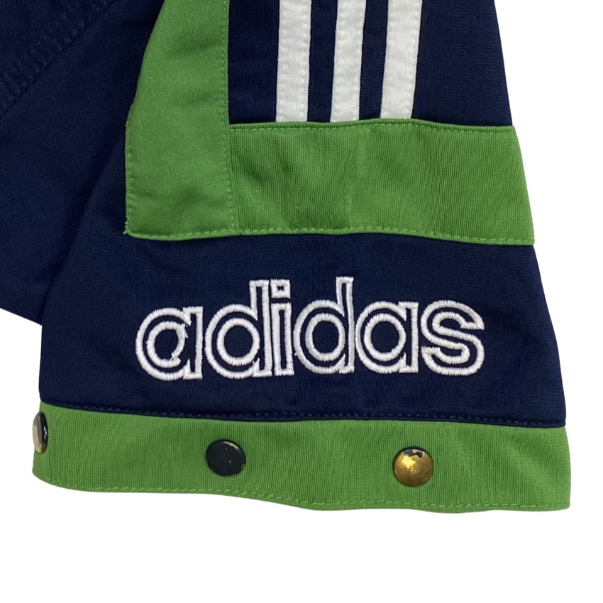 Adidas-Dark-Blue-Green-Kids-Shortsleeve-Tracksuit-Sweatshirt. dětská tmavě modrá tepláková značková vintage mikina s krátkým rukávem a zeleným logem na zádech