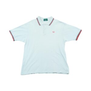Pánské světle modré vintage polo tričko značky Fred Perry s krátkým rukávem a logem na přední straně Light Blue Polo Shirt