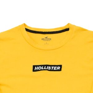 Pánské žluté tričko značky Hollister s dlouhým rukávem a nášivkou na přední straně Yellow Longsleeve T-Shirt