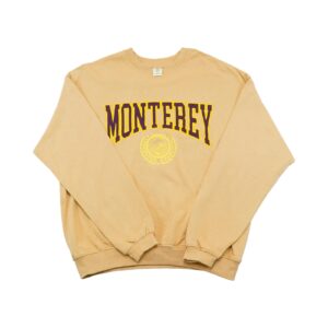 Monterey Crewneck. Pánský béžový crewneck značky Urban Outfitterrs s nášivkou loga Monterey na přední straně.