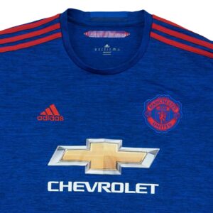 Fotbalový modrý dres značky Adidas s krátkým rukávem a motivem anglického fotbalového týmu Manchester United ze sezóny 2016-2017 Blue Jersey